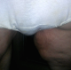 One of our users records his large wife taking a shit in her white panties. The bulge grows so big that poop pours out of the sides and onto the floor. Her panties are pulled down to show off the mess left on her ass and the clump of shit in her panties.